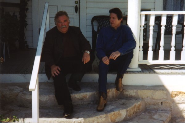 Paul Partain and Ed Neal on the steps of the Kingsland Old Town Grill.